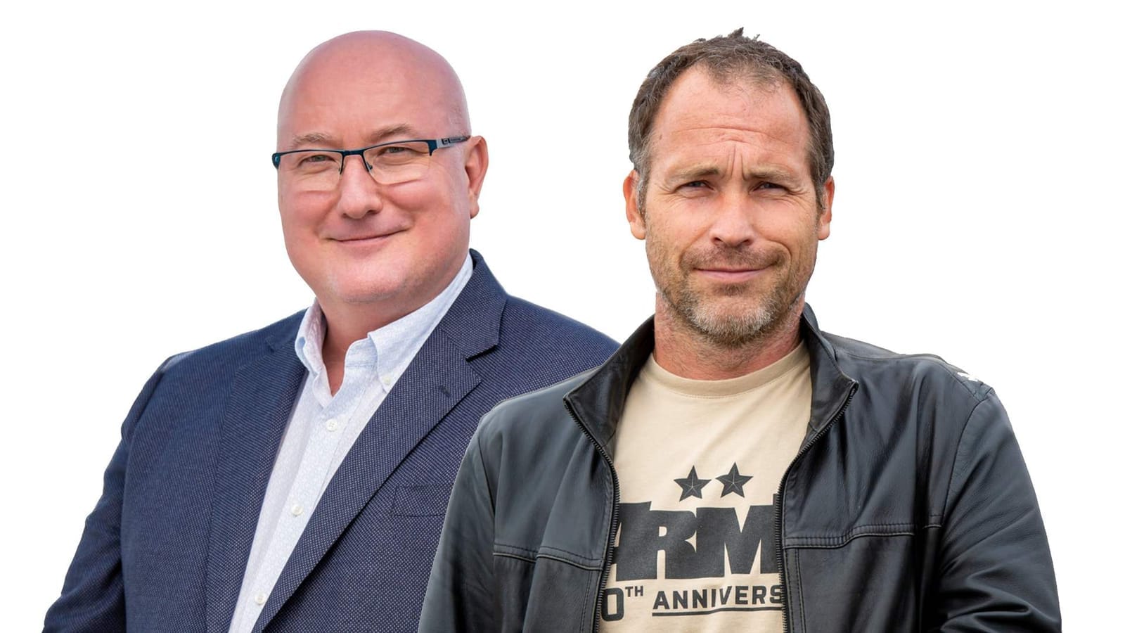 Marek Španěl in glasses and a dark blazer beside Slavomír Pavlíček in a black leather jacket over a printed T-shirt