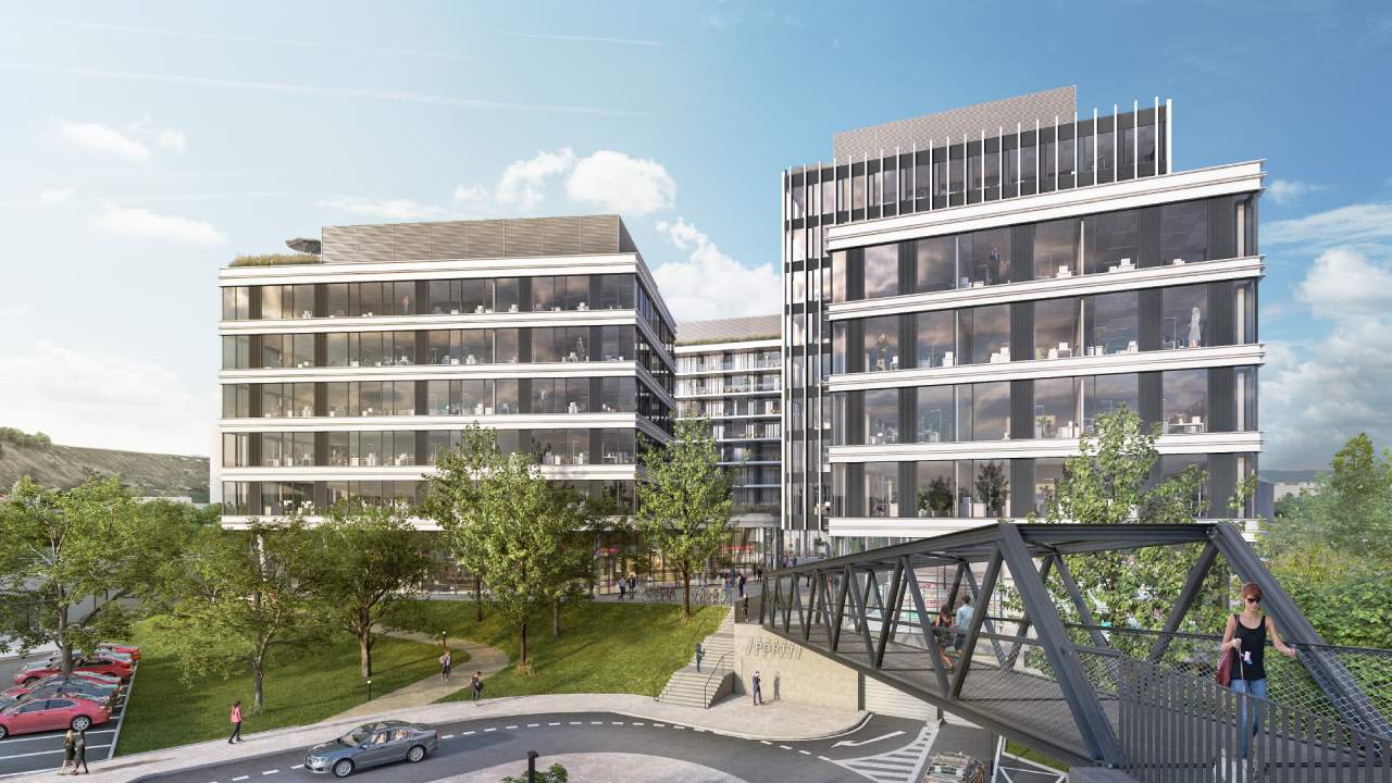 Architectural rendering of the Port 7 office complex in Prague, future home of publisher Economia, with glass-and-white buildings, a steel footbridge and trees