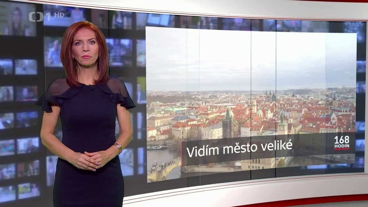 Nora Fridrichová in a studio in front of a screen showing Prague rooftops with the caption "Vidím město veliké" and the "168 hodin" logo