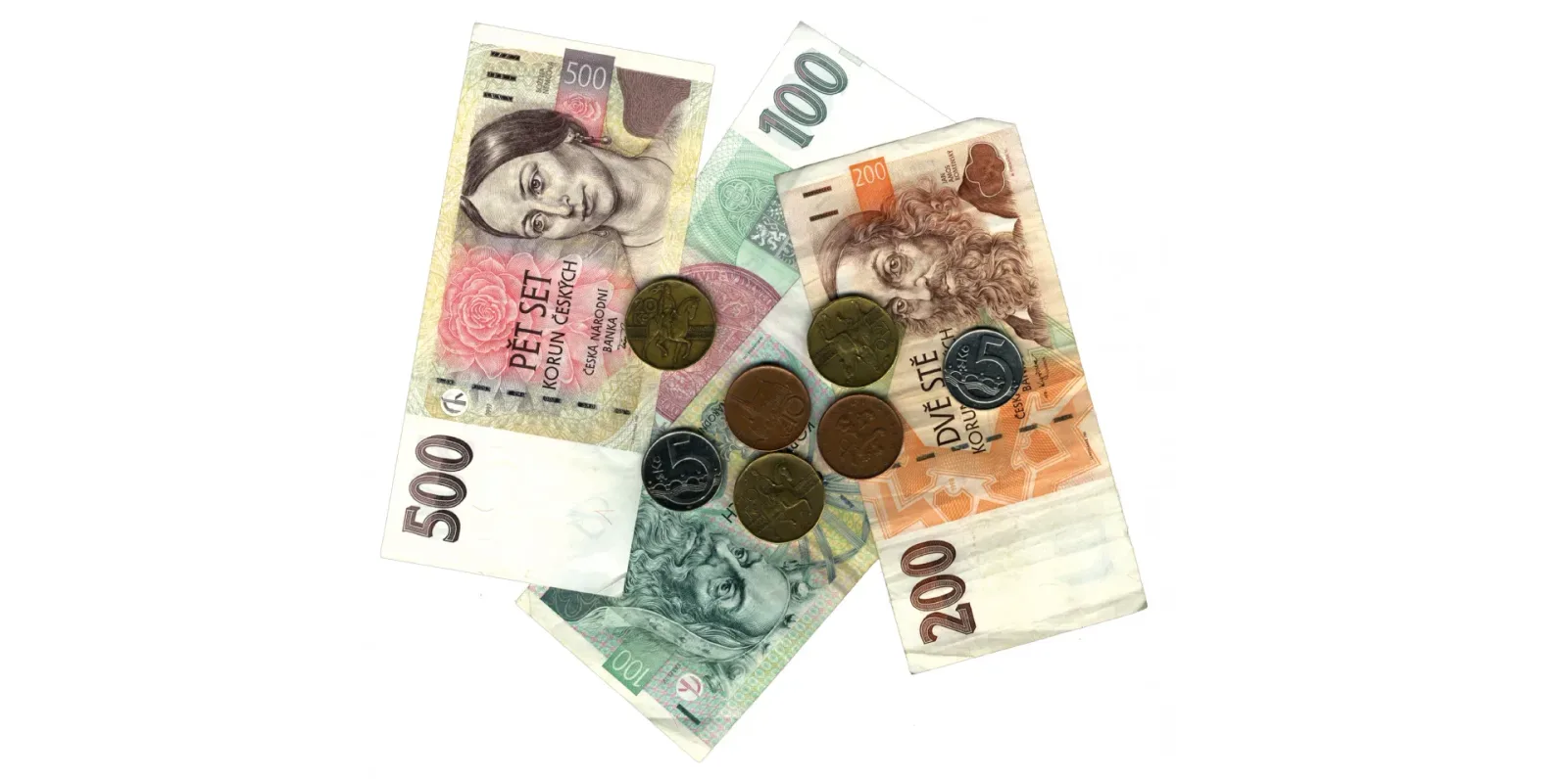 Czech banknotes of 500, 200 and 100 koruna with several coins on a white background