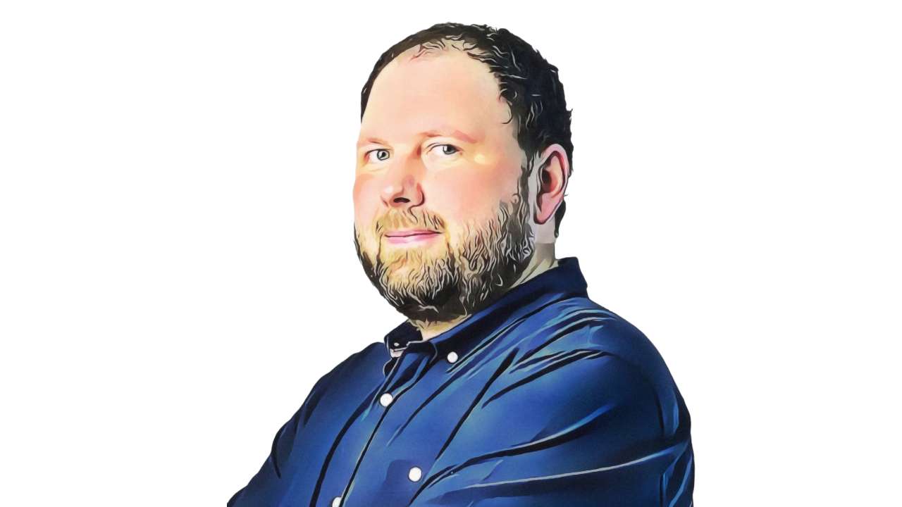 Stylised portrait of Jan Nevyhoštěný, a bearded man in a dark blue shirt with arms crossed against a white background